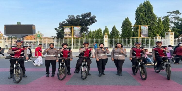 Polwan Lantas Polda Riau Turun Lapangan Sosialisasikan Rekayasa Lalu Lintas Pengamanan Sukses Bhayangkara Run 2025