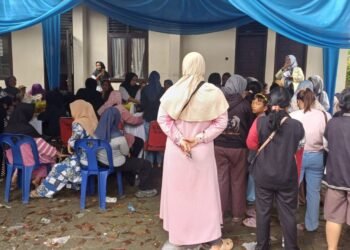 Penyerahan Bantuan Beras dan Minyak di Kelurahan Bencah Lesung Berlangsung Tertib, Tapi Timbulkan Kontroversi Pungli Parkir