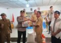 KAPOLDA SULUT, Irjen Pol Roycke Langi Didampingi Bhayangkari dan Bupati Bolmong Serahkan Bantuan Bencana Banjir Bandang di Solimandungan