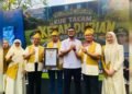 PECAH REKOR MURI! PEMKO PEKANBARU BENTANG KUE TALAM KETAN DURIAN 1 KM DI HUT KOTA KE-242