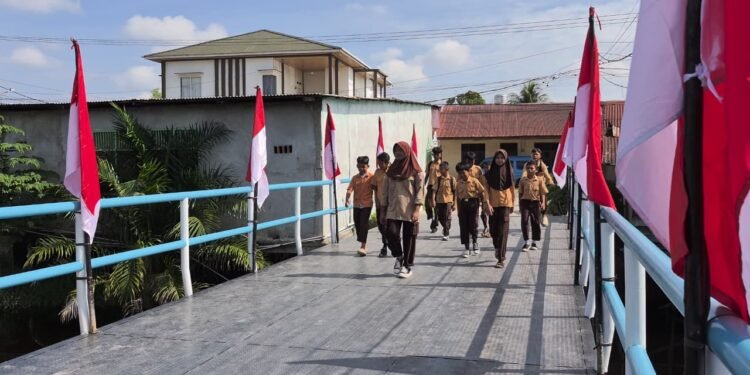 Warga Bumi Ayu Antusias Nantikan Kapolri Resmikan Jembatan Merah Putih