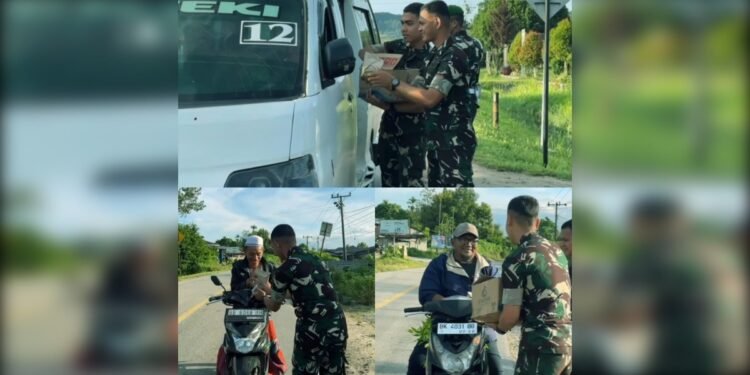 Pagi Berkah Yonif TP 908/Pertaki, Prajurit Berbagi Sarapan dan Air Mineral kepada Masyarakat